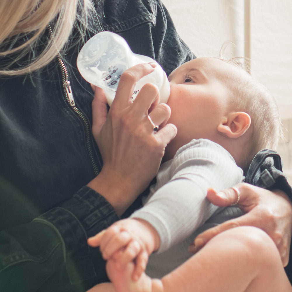 Tommee Tippee 340ml bottle held in hand for comfortable use