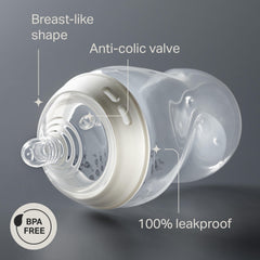 Tommee Tippee Natural Start 11oz bottle close-up with clear measurement markings.