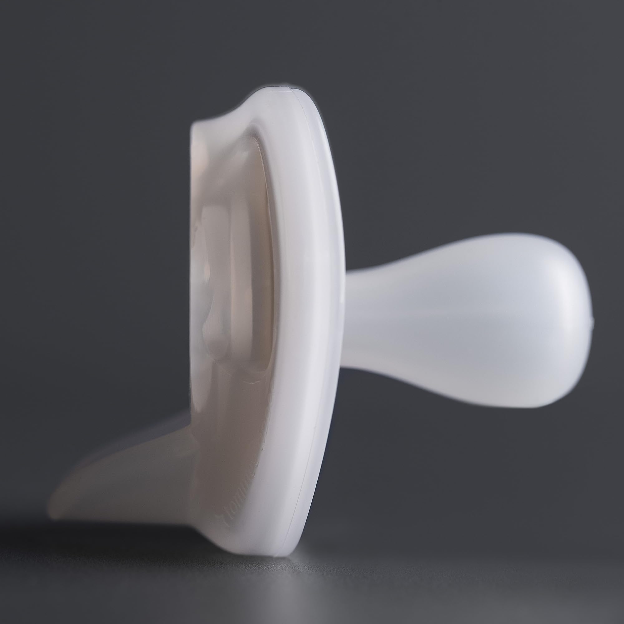 Tommee Tippee Ultra-Light Pacifier air holes promote breathable skin and comfort.