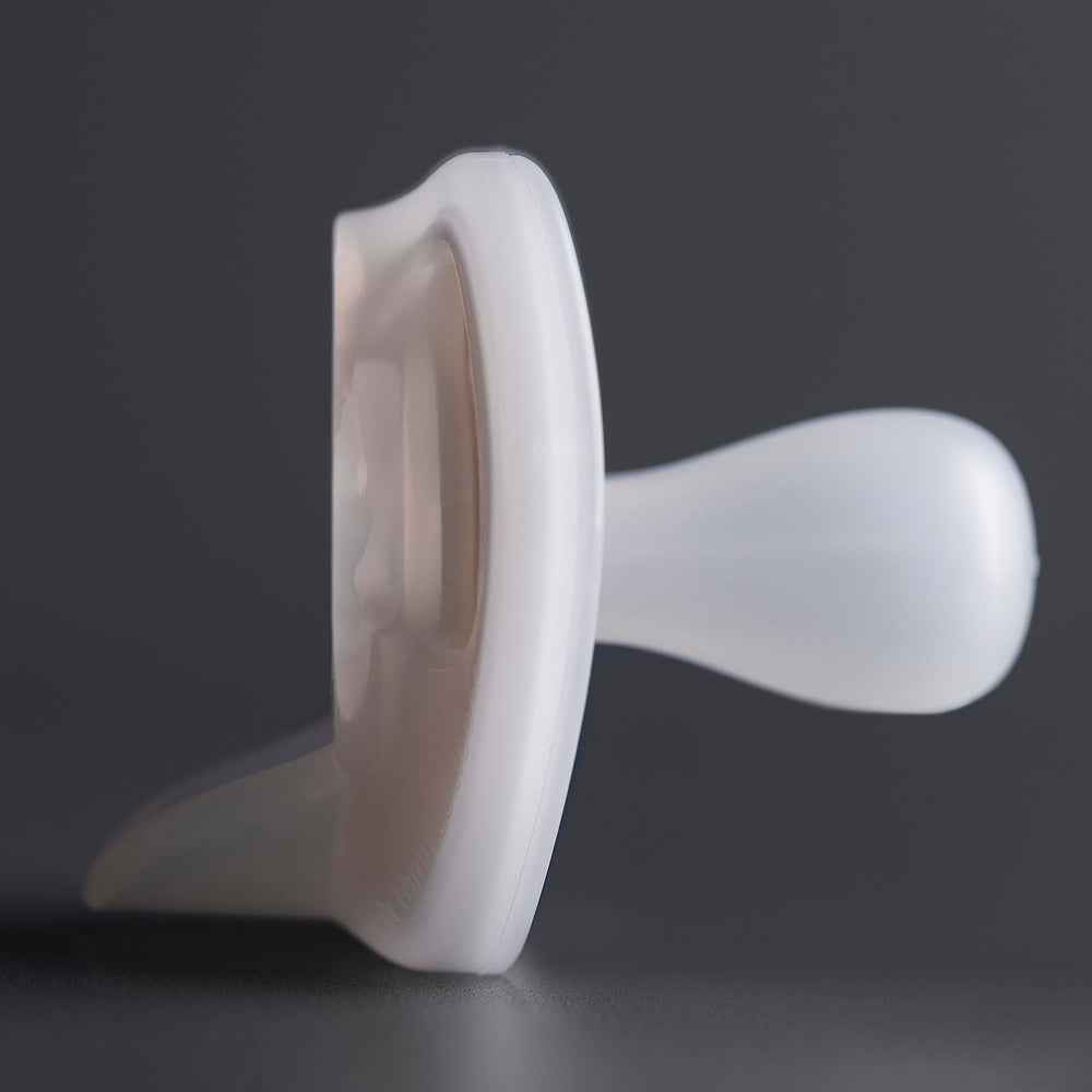 Tommee Tippee Ultra-Light Pacifier air holes promote breathable skin and comfort.