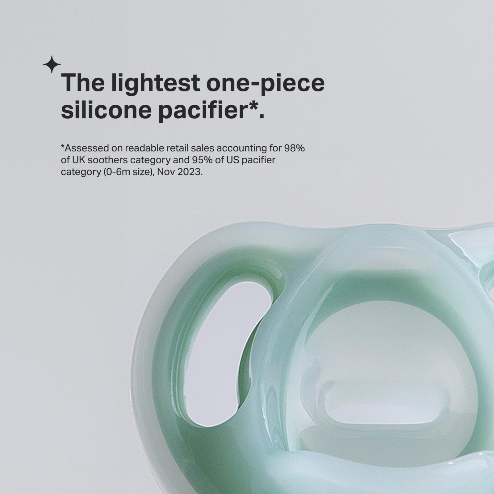 Tommee Tippee Ultra-Light Pacifier curved shield—maximizes comfort between nose and chin.