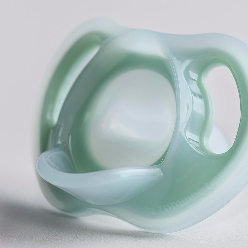 Tommee Tippee Ultra-Light Pacifier four-pack—convenient replacement and travel ready.