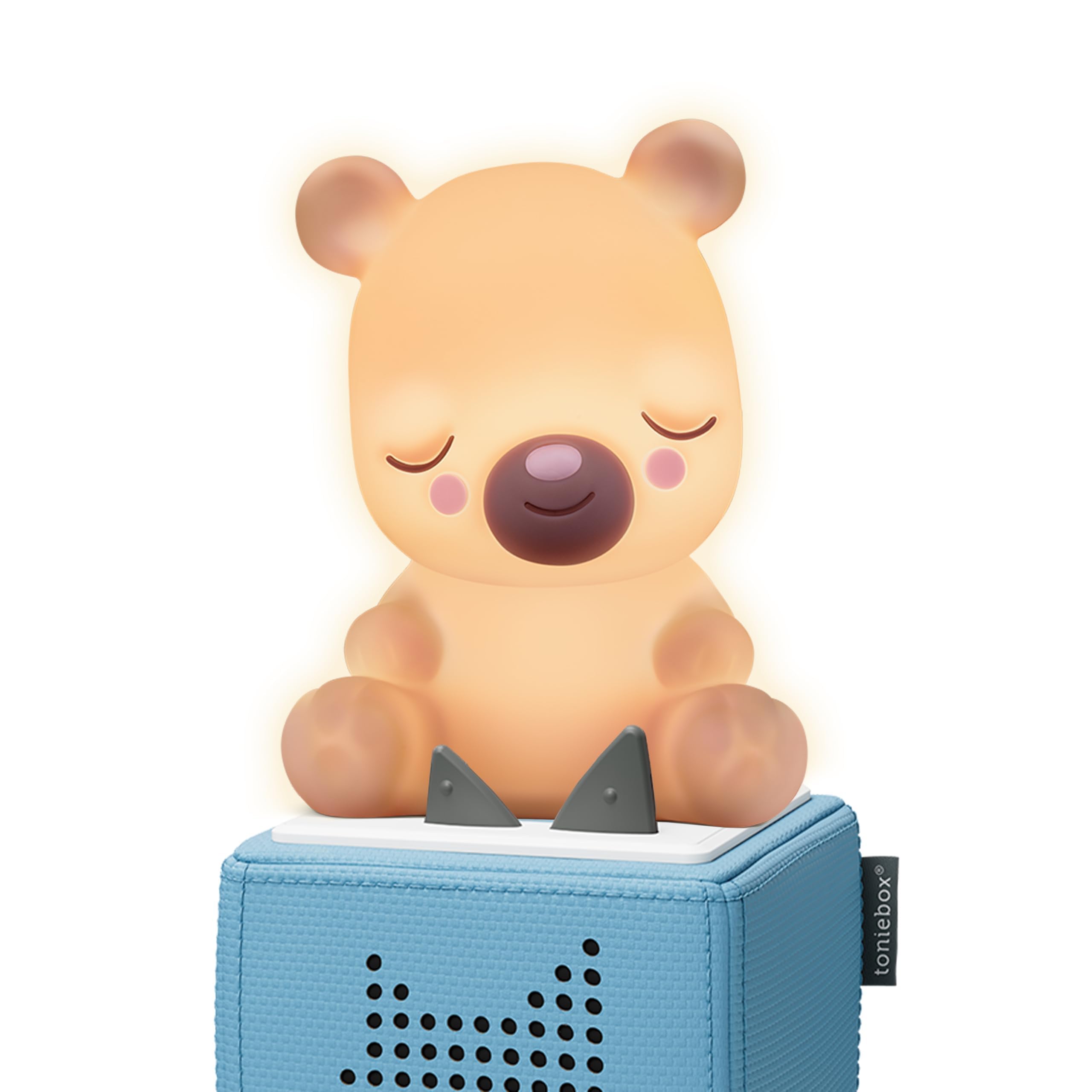 Tonies Sleepy Bear Night Light on table provides a calming glow for bedtime routines.