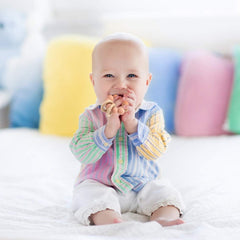 TopGomes baby teether demonstrates right grip size for easy grasp.