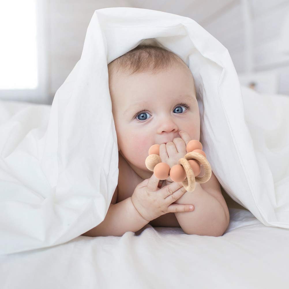 TopGomes black silicone teether is durable and BPA-free for infants.