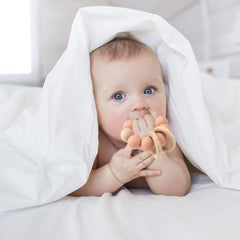 TopGomes black silicone teether is durable and BPA-free for infants.