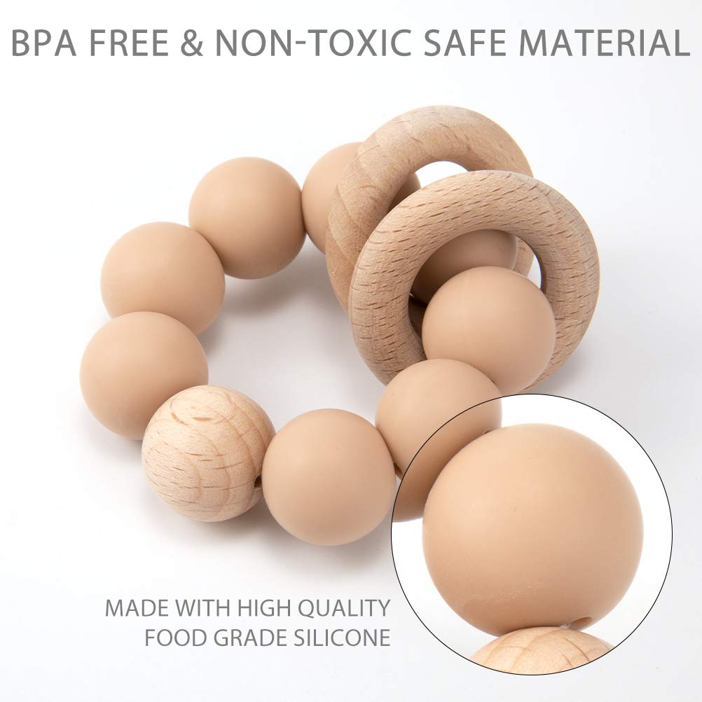 TopGomes teether sage in use provides gentle teething comfort during playtime.