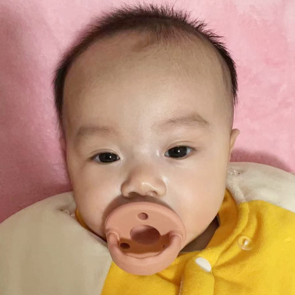 TopGOMES food-grade silicone pacifier for safe, gentle silicone feel and easy cleaning