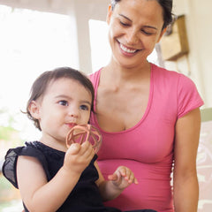 TOPGOMES teether sage hollow-design - accessible from any angle.
