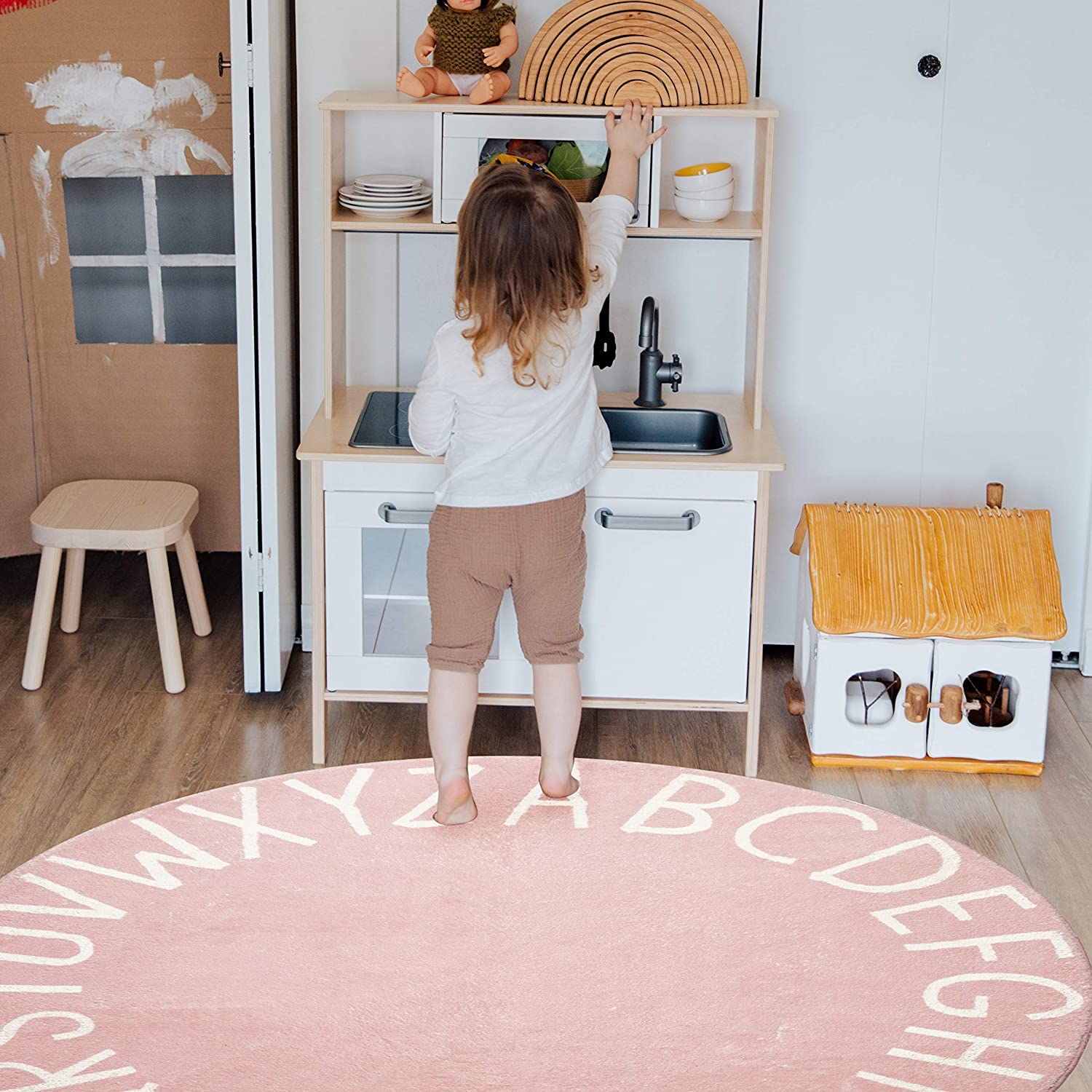Topotdor kids room decor rug bright pink color enhances playroom atmosphere.