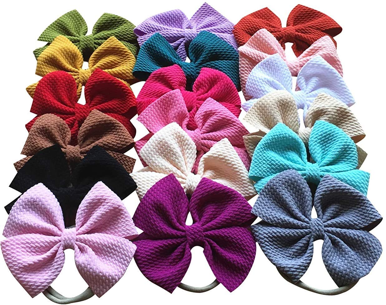 Toptim baby-bow headband made of soft nylon for comfortable, non-slip wear.