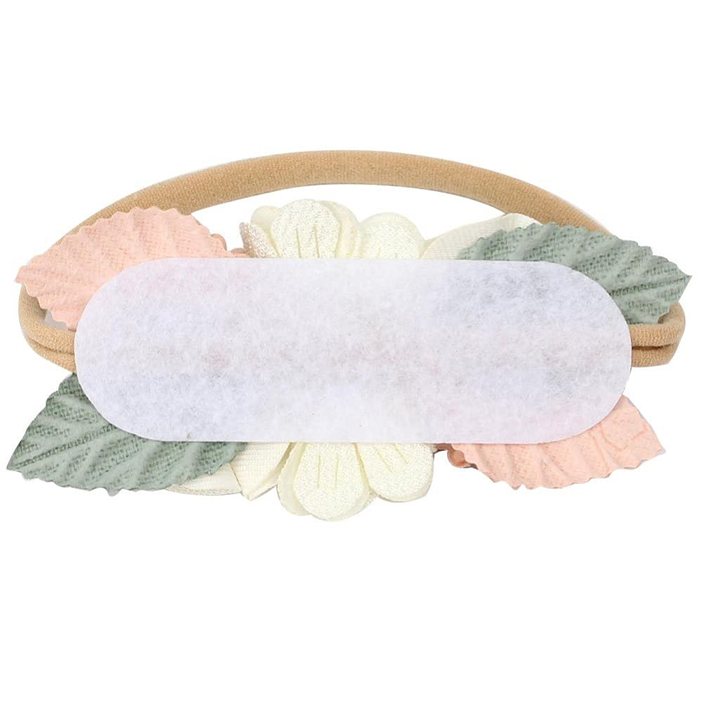 Toptim baby floral headband closeup shows soft, stretchy nylon for comfortable wear