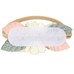 Toptim baby floral headband closeup shows soft, stretchy nylon for comfortable wear