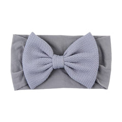 Toptim headbands are stretchy elastic bands that hold hair securely without slipping.