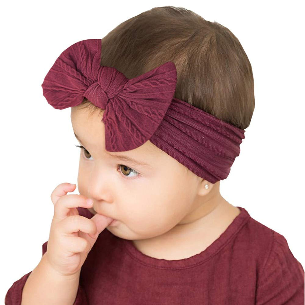 Toptim soft nylon stretch headbands offer comfortable all-day wear for tiny tots