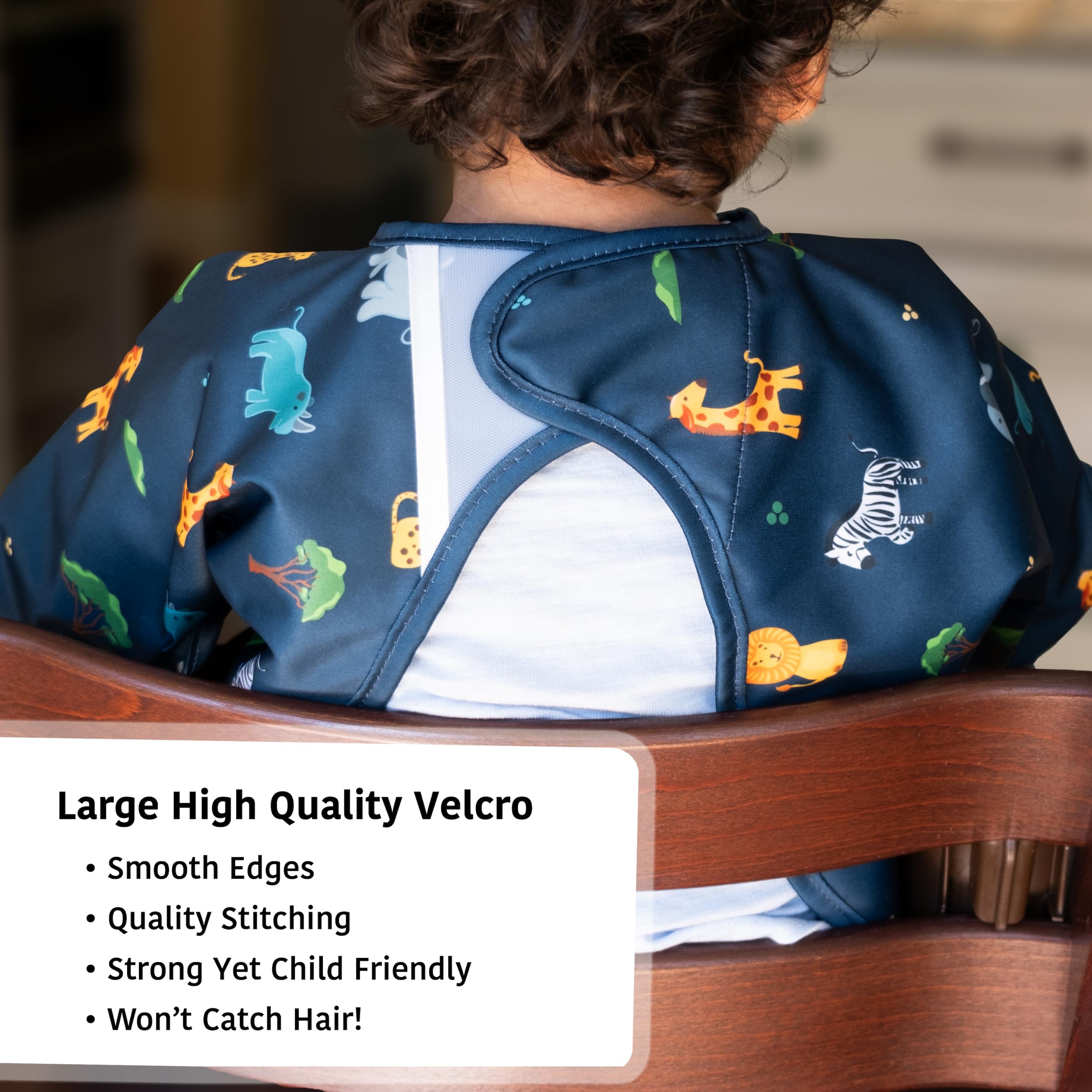 Torange baby smock bib in a dining scene reduces spills on the floor