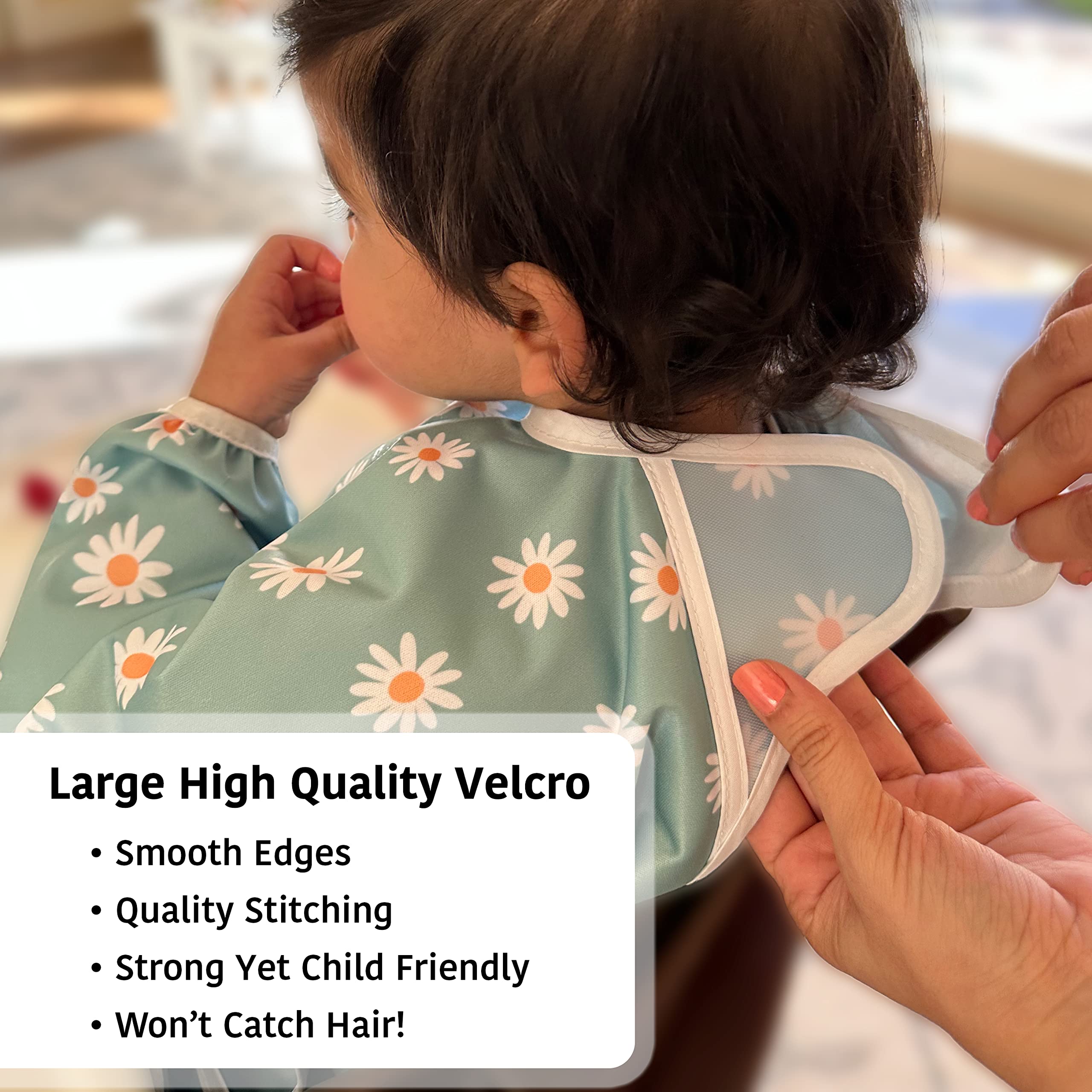 Torange bib adjustable neckline demonstrates grow-with-child feature for extended use.
