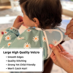 Torange bib adjustable neckline demonstrates grow-with-child feature for extended use.