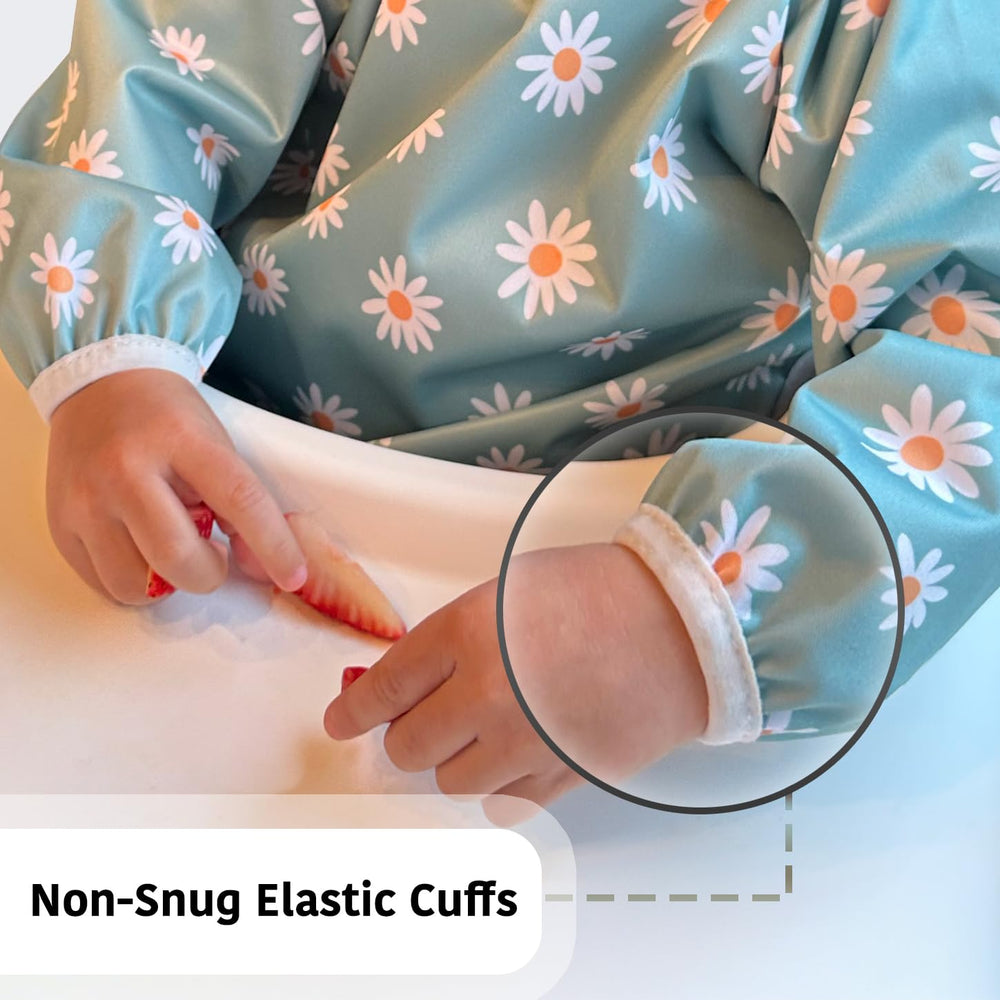 Torange bib surface demonstrates wipe-clean, machine-washable convenience.