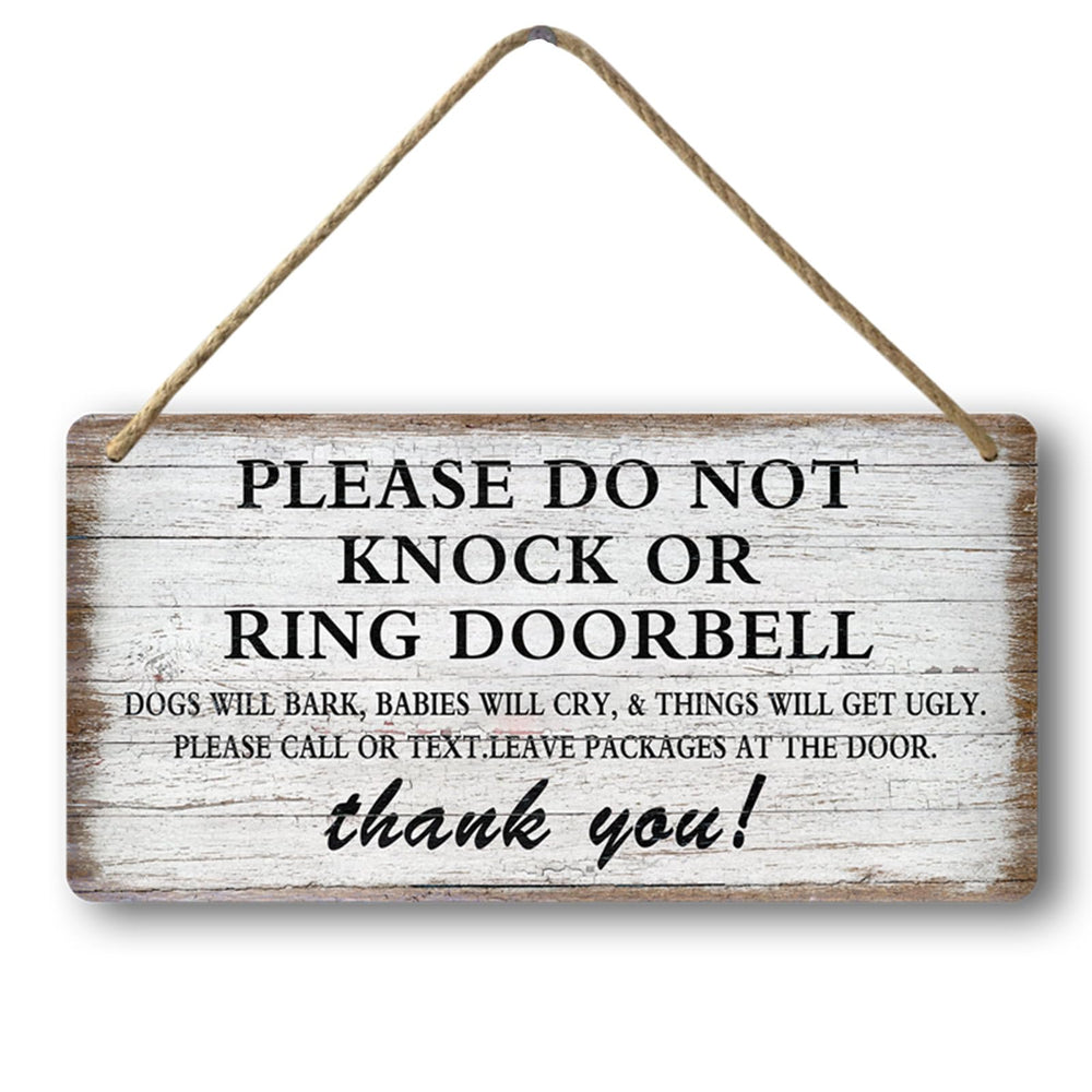 tosles baby sleeping sign on front door keeps naps peaceful.
