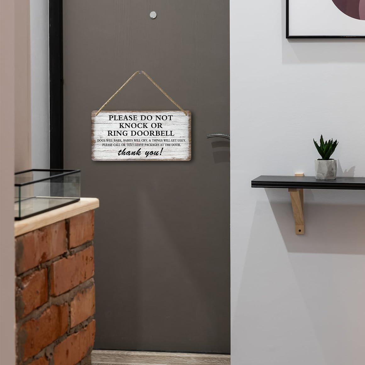 tosles dog-barking-reminder-sign helps keep entry calm and welcoming.