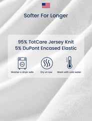 TotAha 2-pack soft sheets in use on playpen, illustrating easy washing.