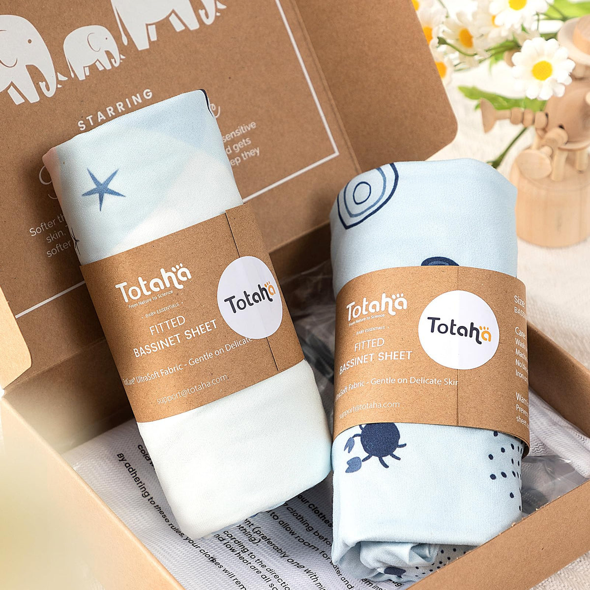 TotAha bedside sleeper sheet close-up shows buttery-soft microfiber for cozy nights.