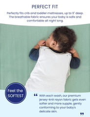 TotAha Botanical crib sheet stretch-fit edge demonstrates secure, deep-pocket design