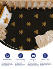 TotAha crib sheets 9-inch deep pocket close-up, secure fit on deep mattresses.