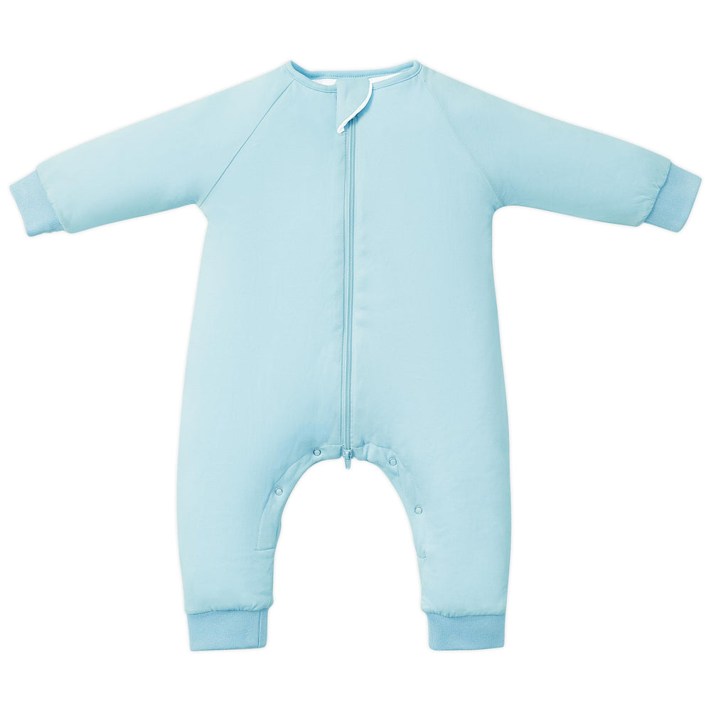 TOTBASIC 1.0 TOG sleep sack in Baby Blue on a baby promotes cozy warmth.