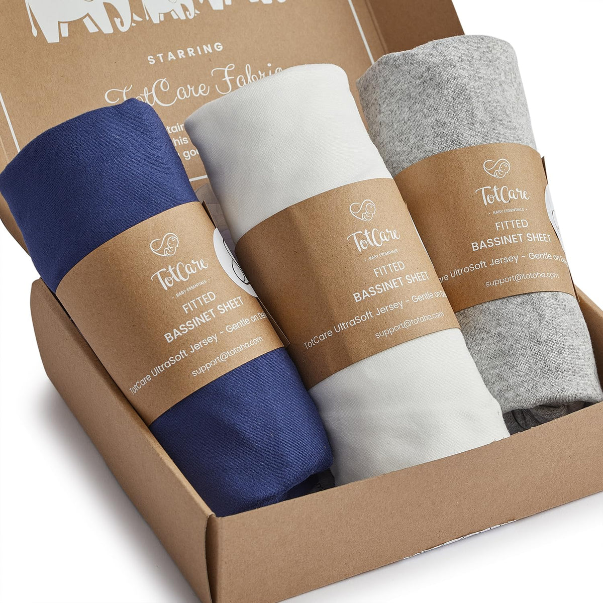 TotCare bassinet sheets packaged, buttery-soft feel ready for baby's nursery.