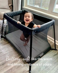 TotCare cloud sheets on travel crib highlighting cozy, breathable fabric for restful naps.