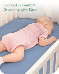 TotChill deep-pocket crib sheet closeup showing secure fit