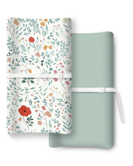 TOTCHILL changing pad cover shows two-color design for snug, comfortable diaper changes.