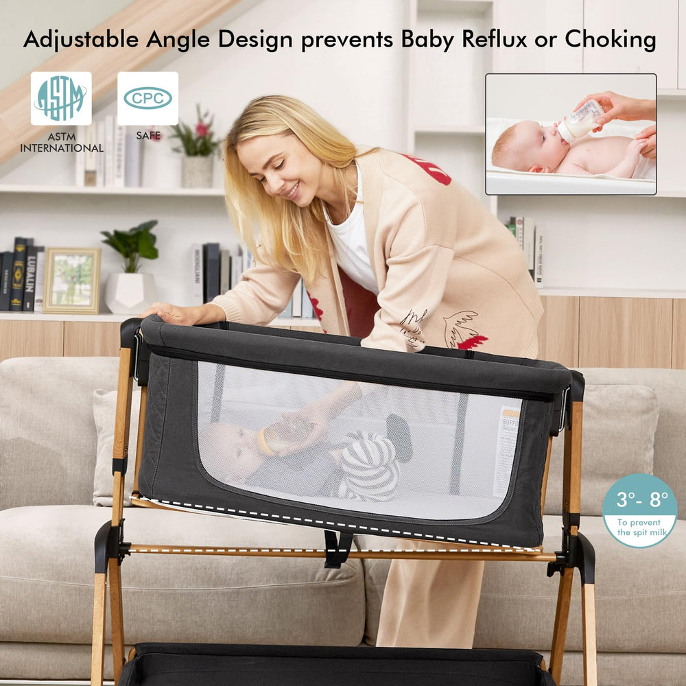 TotRun bassinet bedside sleeper black mattress showing breathable comfort for baby.