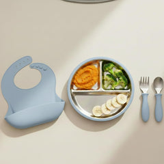 TOTS GROUND silicone bib in baby blue with adjustable neck for comfortable fit.