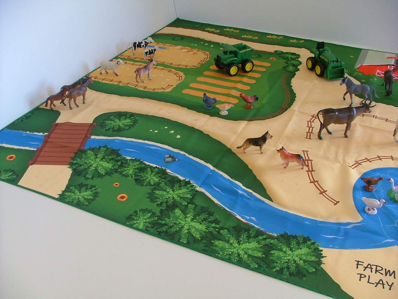 Toy Fish Factory Multiple holding areas on mat enabling organized toy placement