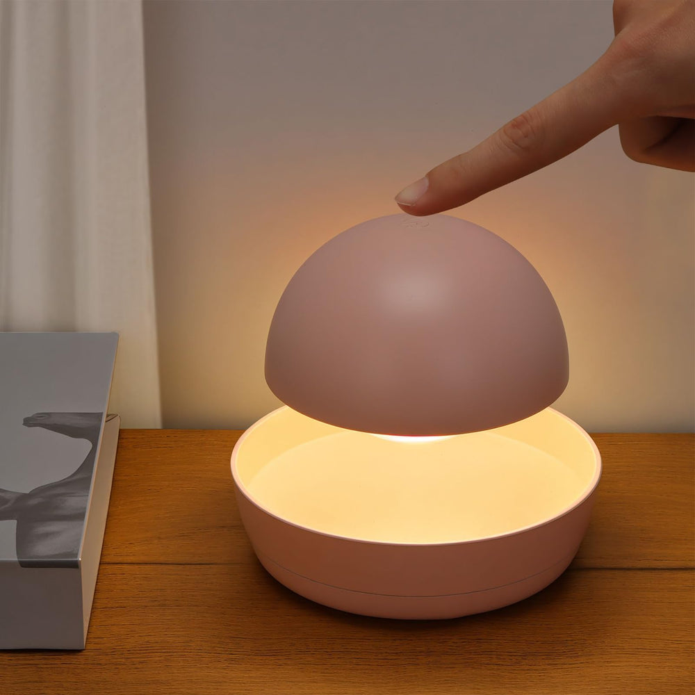 Toyunia nursery night light at bedside showing warm glow for calm bedtime routines.