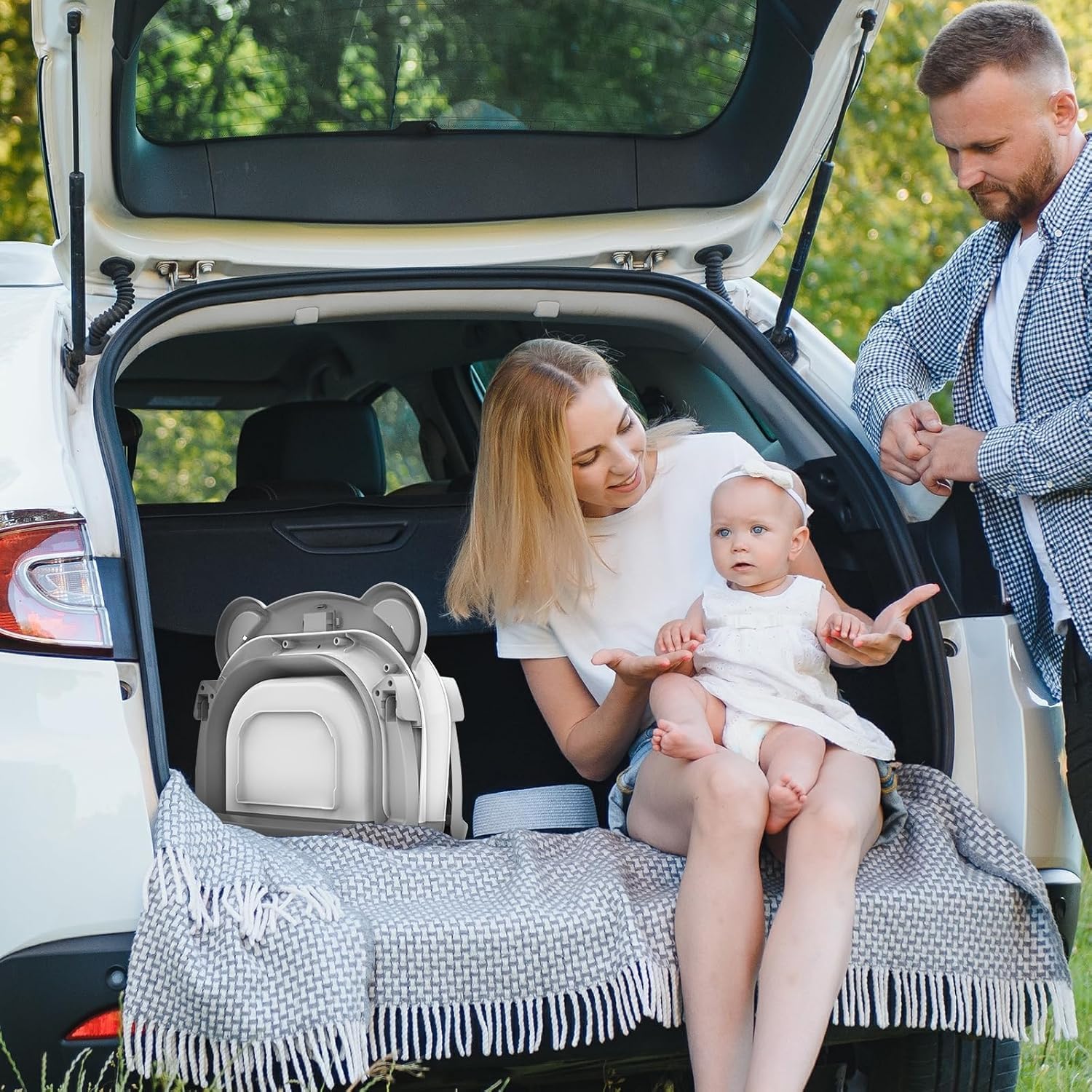 TPN collapsible baby bathtub in use with baby showing hands-free playtime.