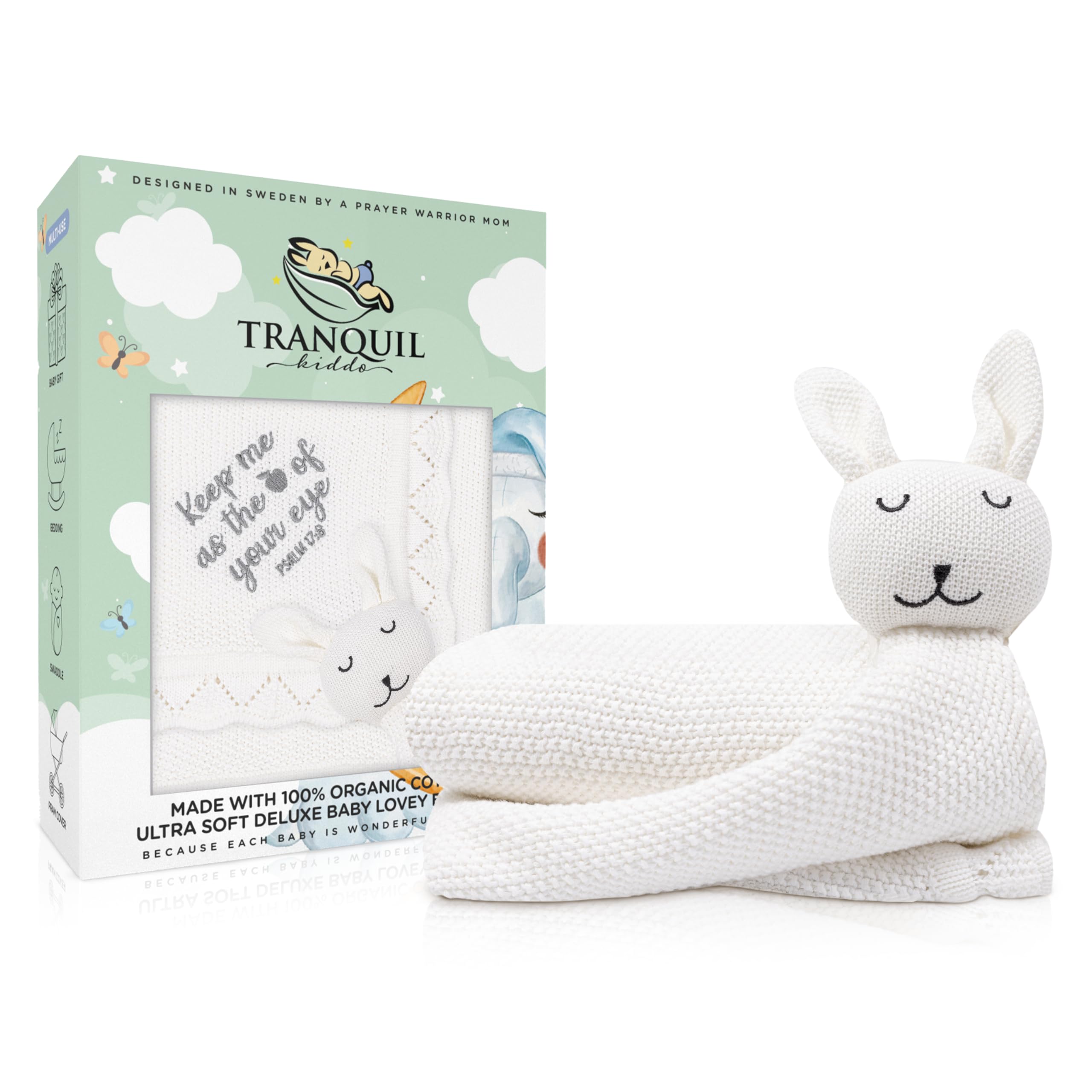 TRANQUIL KIDDO Christian baby blanket creme white folded offers cozy newborn warmth.