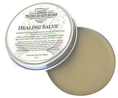 Traverse Bay herbal salve application showing a soothing, botanical blend.
