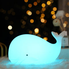 TriPro Whale Silicone Night Light in a soft beach nursery scene for cozy ambiance