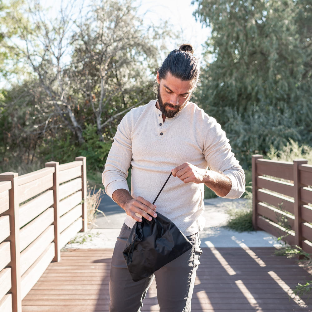 Tridee Dad Diaper Bag in-use shot shows versatile backpack for parents.