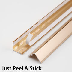 Applying Trimold peel-and-stick L-molding to a wall corner for quick installation.