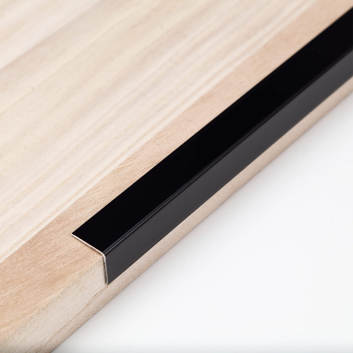 Trimold aluminum L-molding wall guard protects walls with a sleek metal look.
