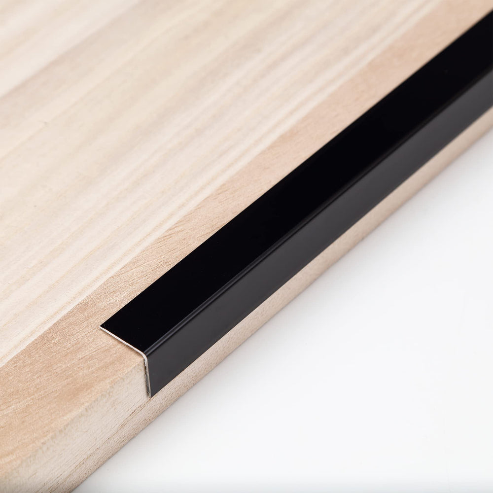 Trimold aluminum peel-and-stick L-molding corner guard with 90-degree angle protects walls from dings and scuffs.
