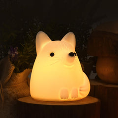 TriPro Fox Night Light on table with calming bedtime glow.