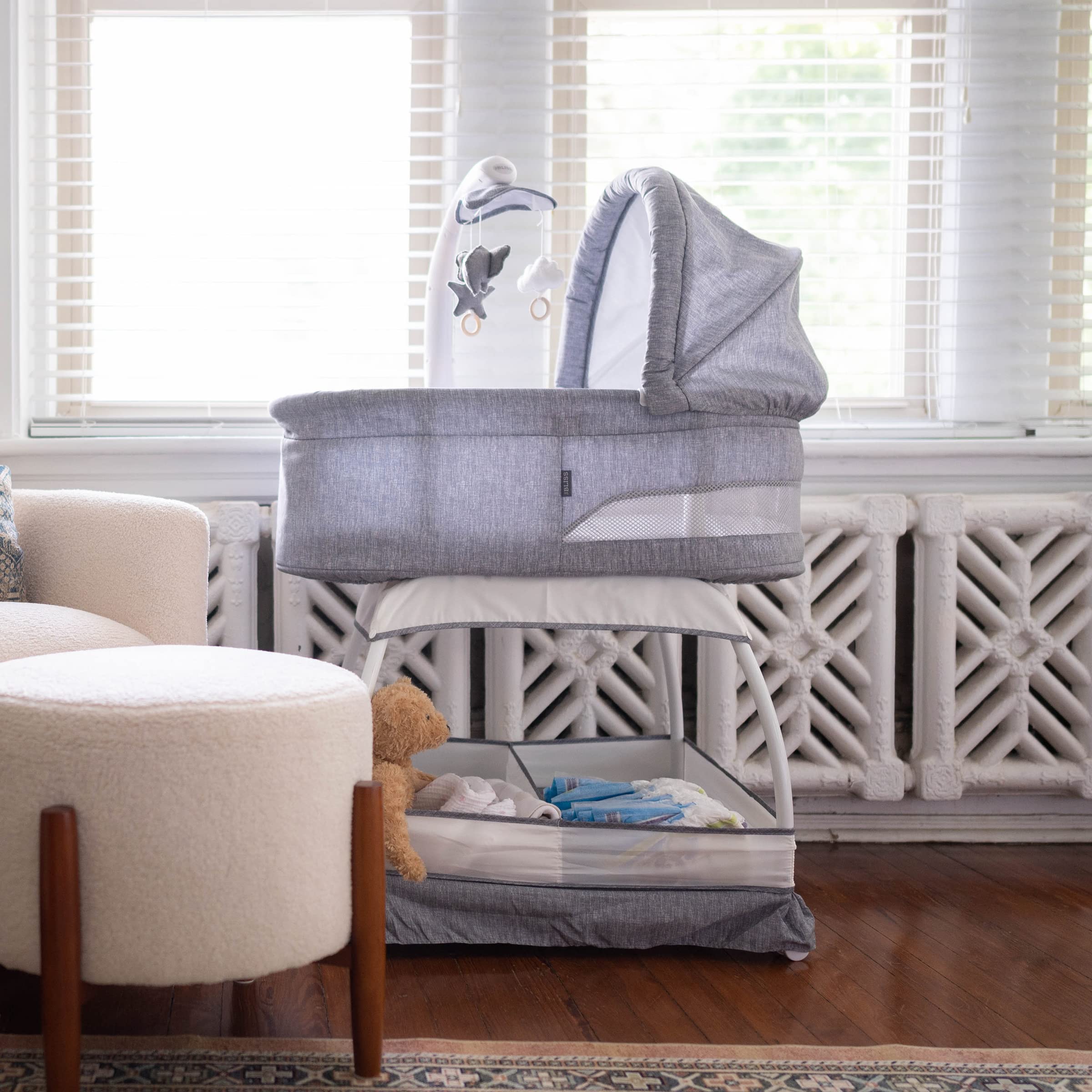 TruBliss Sweetli Deluxe bassinet mobile in action soothing baby with gentle motion