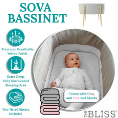 TruBliss Sova bassinet Beech wood legs close-up showing sturdy construction.