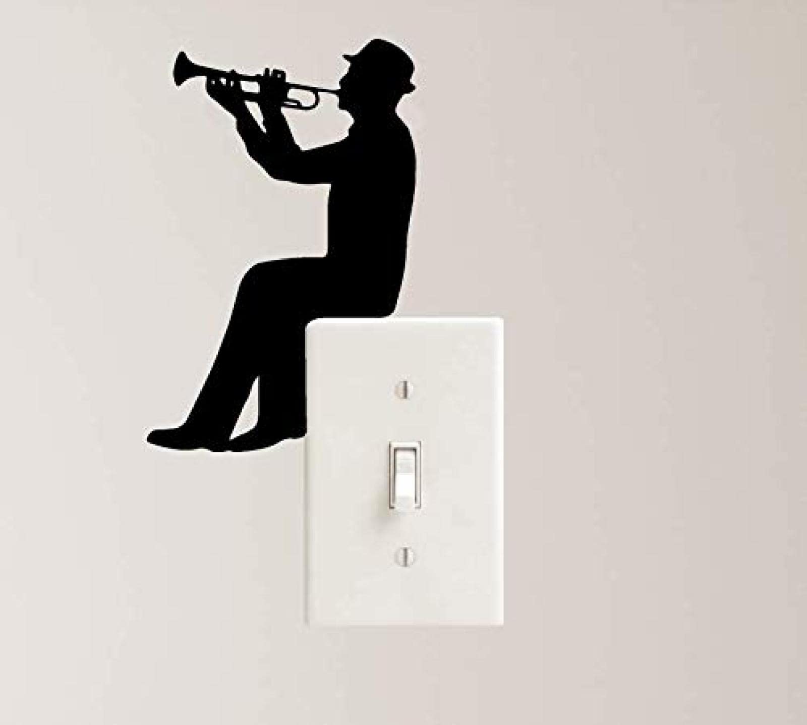 Trumpet music decal on laptop enhances workspace with sleek, removable wall-safe decor